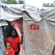 Boys look out from their shelter on Nov. 1, 2013, in Pétion-ville, Haiti, at a camp for earthquake victims.
Louis-Joseph Olivier/AFP/Getty Images